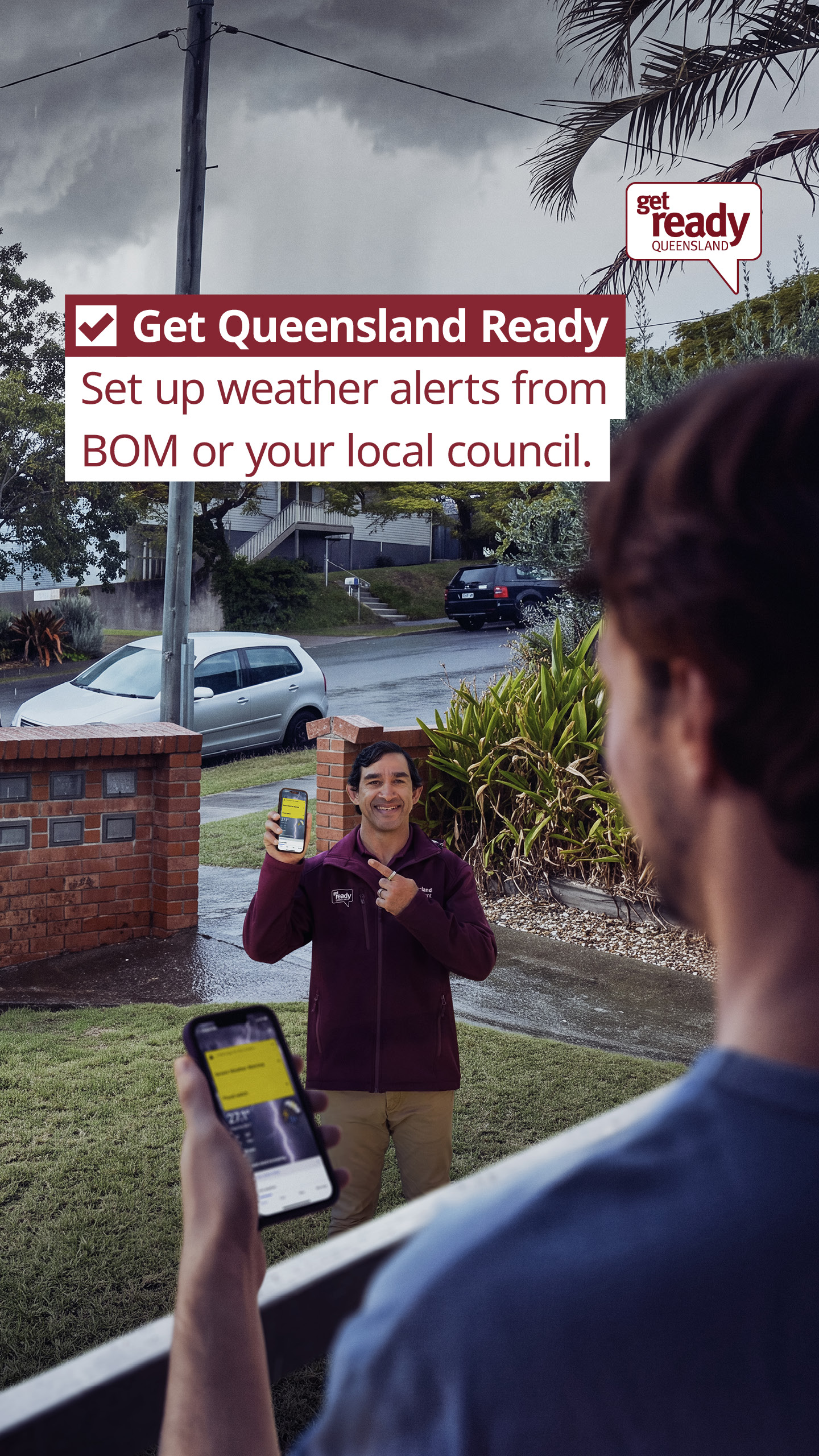 Get Queensland Ready Promotional image with Jonathan Thurston holding up his phone with a BOM Weather Warning visible facing him in the foreground