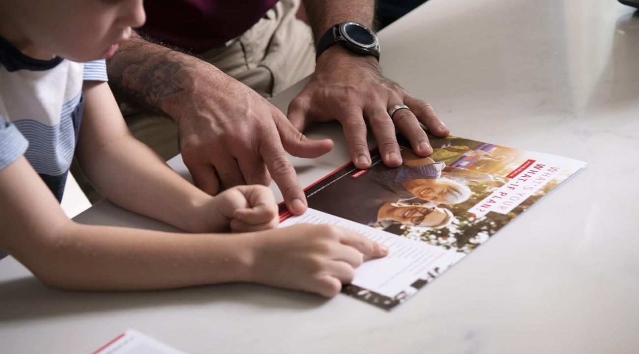 Close up of family checking emergency plan