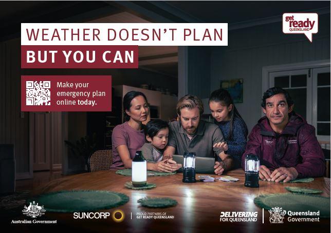 Family sat around table at night with electric lamps 