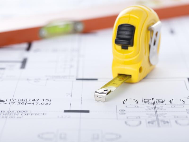 Tape measure and plans