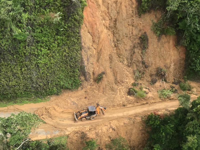 Bulldozer clearing landslide
