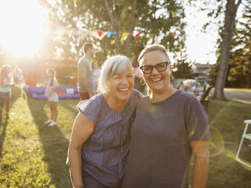 Women smiling in park