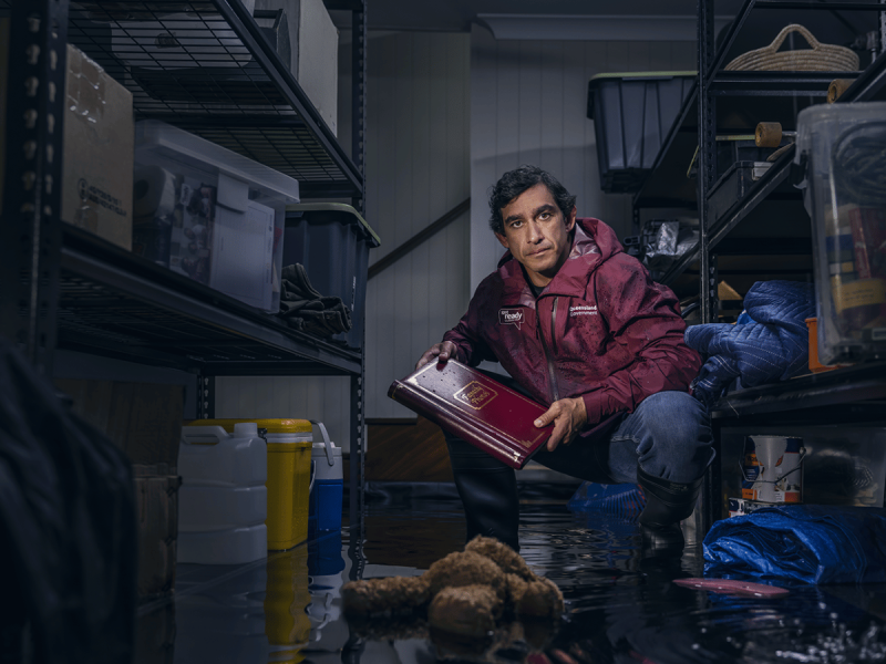 Johnathan Thurston checking flood damage